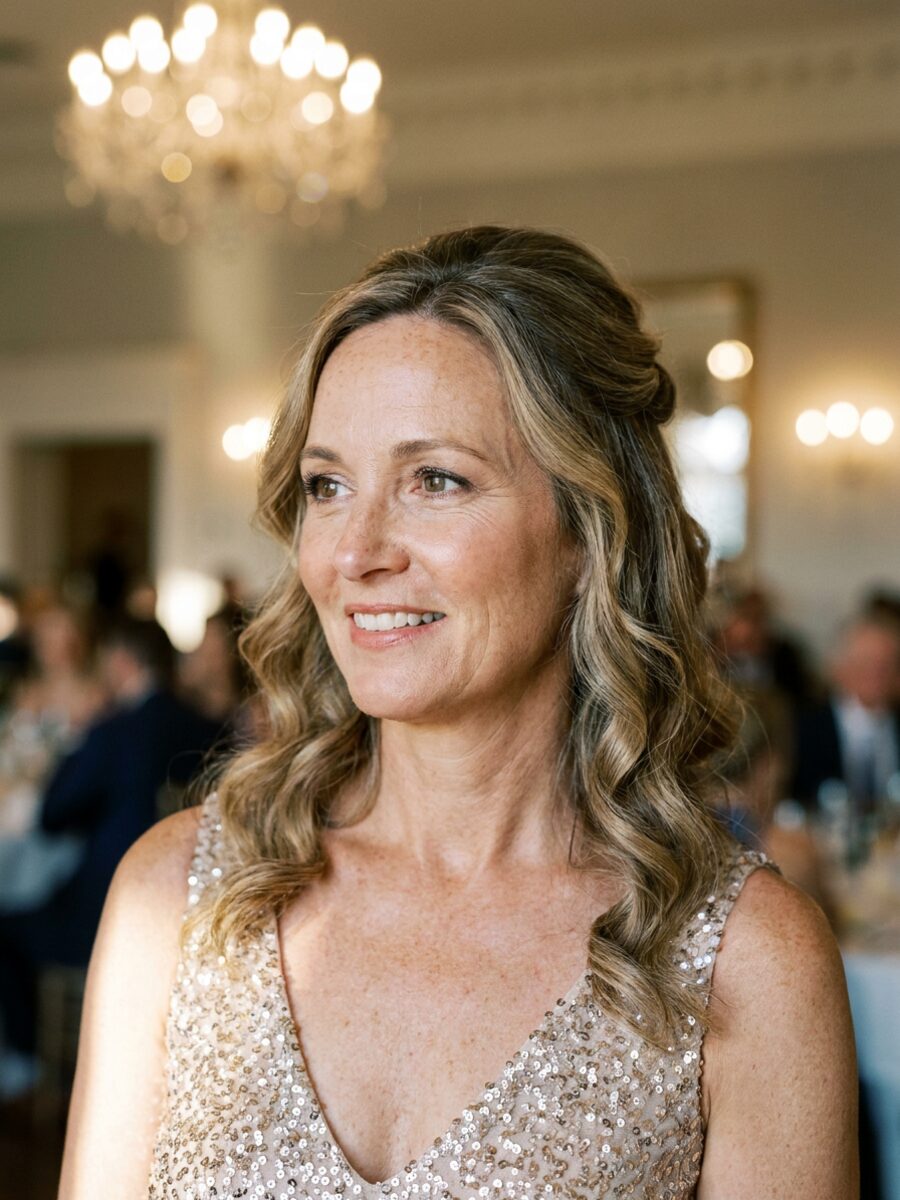 Woman styled with soft waves for a special event at The Crown Hair Studio in Orlando, FL