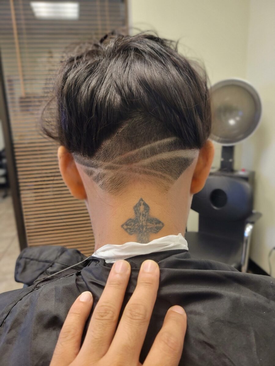 Geometric hair design shaved into the nape at The Crown Hair Studio in Orlando, FL